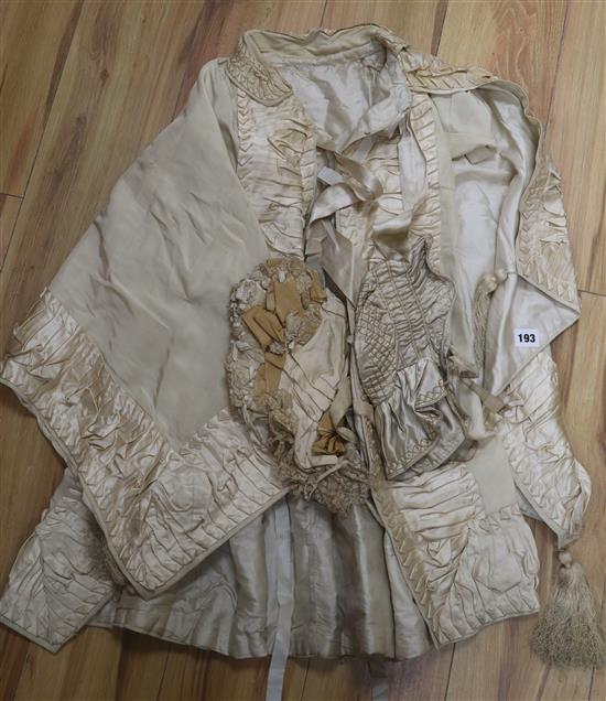 A Victorian childs cape and two bonnets